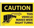 Caution This Vehicle Make Wide Right Turns Sign